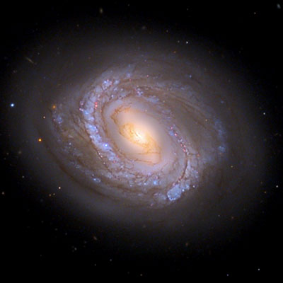 Image of barred spiral galaxy M58