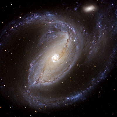 Barred spiral galaxy NGC 1097 in Fornax