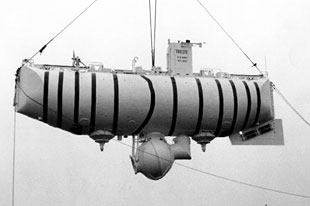 Image of the bathyscaphe Trieste being hoisted into the ocean