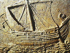 Image of an ancient stone tablet showing a Phoenicians ship