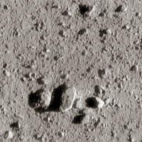 NEAR close-up of asteroid Eros showing rocks on the surface