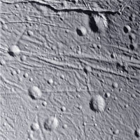 Cassini close-up of Enceladus showing fractures and craters