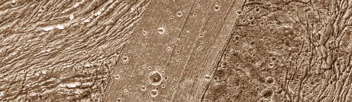 Galileo close-up image of a small region of thin, disrupted, ice crust in the Conamara region of Jupiter's moon Europa showing the interplay of surface color with ice structures