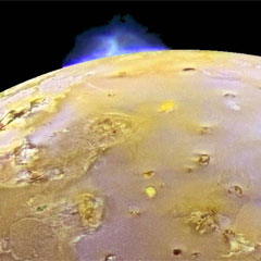 Galileo image of Io showing an erupting volcano on the limb