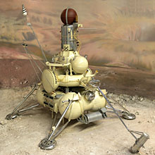 Image of a museum replica of the Luna 16 spacecraft