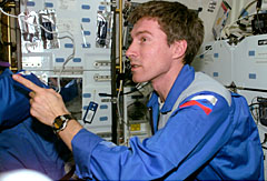Image of Russian cosmonaut Sergei Krikalev on the Space Shuttle Discovery