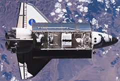 Image of Space Shuttle Endeavour in orbit above Earth