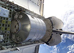 Image of the Leonardo module in the cargo bay of Space Shuttle Discovery