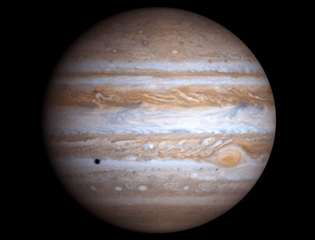 Global view of Jupiter assembled from four separate images taken by NASA's Cassini spacecraft