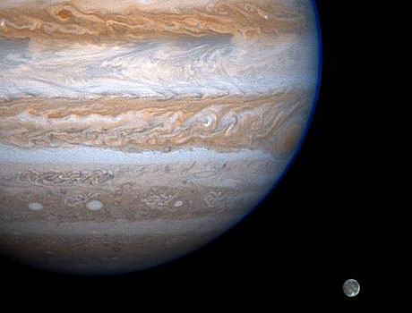 Image captured by NASA's Cassini spacecraft showing Jupiter and its largest moon, Ganymede