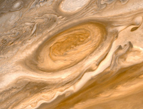 Close-up image of the planet Jupiter taken by NASA's Voyager 2 spacecraft showing the famous great red spot