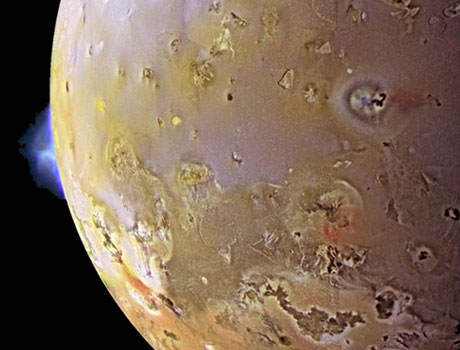 Color image of Io taken by NASA's Galileo spacecraft shows one of the many volcanoes on the small moon