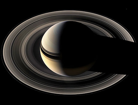 Image of the planet Saturn showing the shadow of the planet falling across the delicate rings