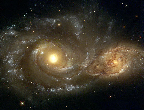 Hubble Space Telescope image of a grazing encounter between two spiral galaxies (NGC 2207 and IC2163)