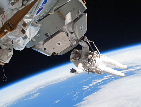 STS-130 image of astronaut Nicholas Patrick performing an Extravehicular Activity (EVA)