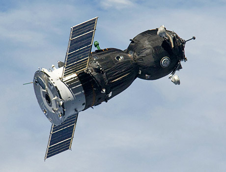 ISS photo of Soyuz TMA-17 spacecraft in orbit above the Earth as it approaches the International Space Station